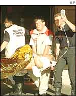 Injured person taken away from Saint-Michel attack