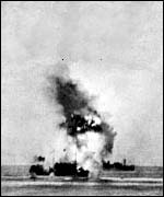 A merchant ship explodes during the Malta convoy 