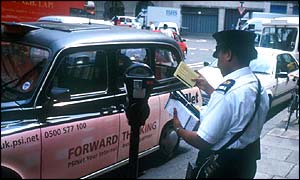 Parking meter and London cab