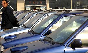 New cars outside a Beijing showroom 