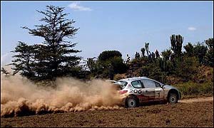 World Rally Champion Richard Burns drives in the Safari Rally