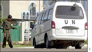 Iraqi guard stops van outside the UN headquarters in Baghdad