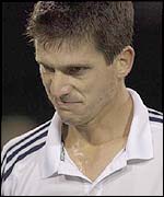 Tim Henman grimaces