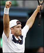 German'y Alex Waske celebrates victory over Carlos moya