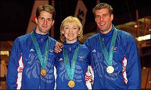 Ben Ainslie (left) and Iain Percy (right) with fellow Sydney gold medallist Shirley Robertson