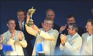 Colin Montgomerie holds aloft the Ryder Cup at the weekend