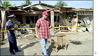 Investigators at the scene of the Zamboanga blast