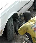 Repairing a car, BBC