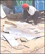 Metal worker in Kibera