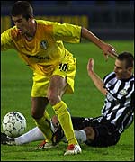 Harry Kewell fends off another challenge