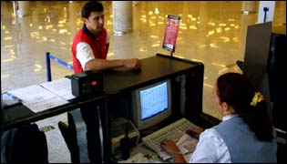 passenger at check-in desk