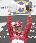 Michael Schumacher celebrates victory in the Belgian Grand Prix