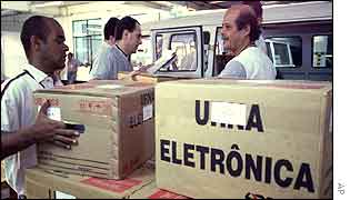 Officials prepare electronic voting macines for distribution in Sao Paulo