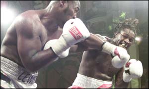 Wade Lewis feels the force of Audley Harrison's jab
