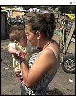 A woman and child in a Brazilian shanty town