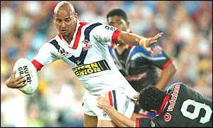 The Roosters' Shannon Hegarty scores the first try of the match