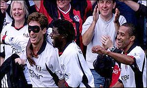 Sava celebrates his winner by strapping on a face mask