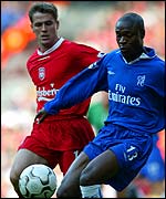 Chelsea's William Gallas protects the ball from Liverpool's Michael Owen
