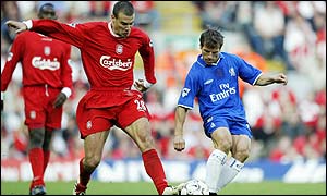 Liverpool's Bruno Cheyrou and Gianfranco Zola compete for the ball