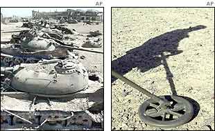 Remains of tanks and a deminer in shadow