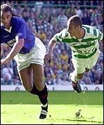 Rangers' Lorenzo Amoruso and Celtic's Henrik Larsson