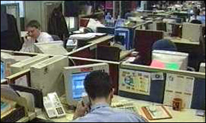 Office workers sitting at their desks