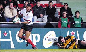 Emile Ntamack leaves a Newport player sprawling in a European game last season