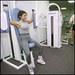 Lady pushing weights