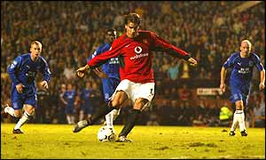 Ruud van Nistelrooy converts a penalty after Ole Gunnar Solskjaer was fouled by David Weir who was then sent off 