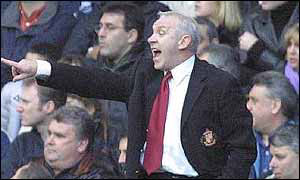 Peter Reid shouts and points at his players