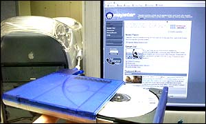 CD in front of Napster website