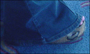 Wedges hidden below jeans