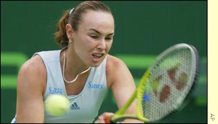 Martina Hingis in action against Arantxa Sanchez-Vicario