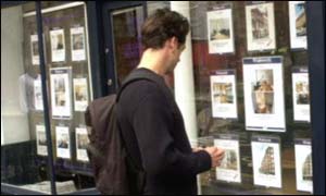 Looking at estate agent's window