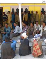 Voters wait for their turn to cast their vote during the fourth phase of voting 