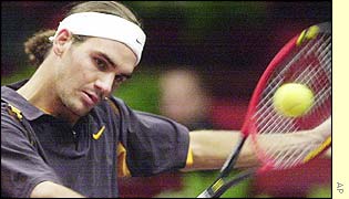 Roger Federer in action against Zeljko Krajan