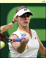 Elena Dementieva on her way to victory over Martina Hingis