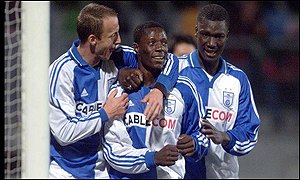 Zimbabwean striker Benjani Mwariwari celebrates another goal