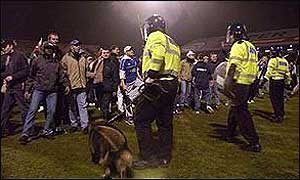 Police face hooligans