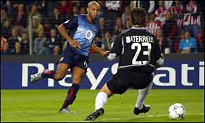 Thierry Henry of Arsenal scores their fourth during the Champions League clash against PSV Eindhoven