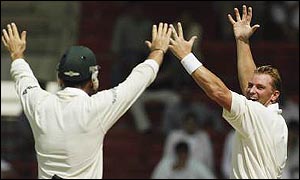 Shane Warne celebrates another wicket