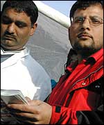 Ahmad Rafique and shopkeeper