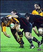 Allan Jacobsen lands another tough tackle for Edinburgh