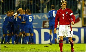 England captain David Beckham comes to terms with Slizard Nemeth's goal