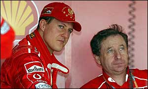 Michael Schumacher with Ferrari sporting director Jean Todt