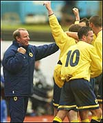 Berti Vogts celebrates with his players