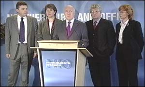 Reid announced suspension flanked by new ministers