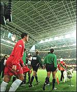 Wales captain Gary Speed leads the team out at the Millennium Stadium in Cardiff