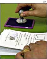 Referendum papers are stamped in Baghdad