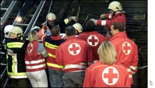 Red Cross workers at rail crash, AP